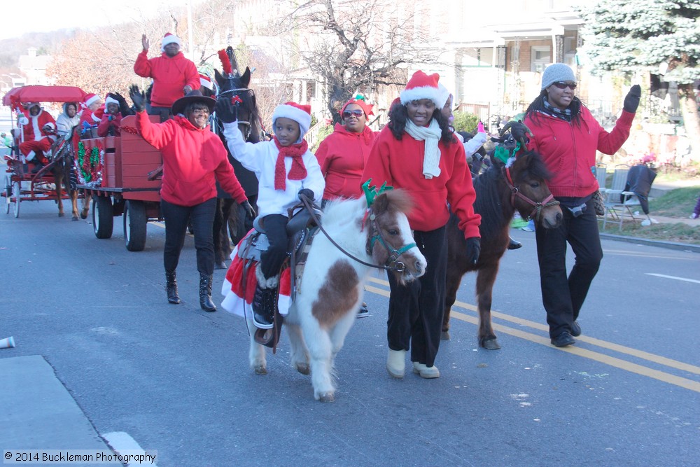 41st Annual Mayors Christmas Parade 2014 - Division 3\nPhotography by: Buckleman Photography\nall images ©2014 Buckleman Photography\nThe images displayed here are of low resolution;\nReprints available, please contact us:\ngerard@bucklemanphotography.com\n410.608.7990\nbucklemanphotography.com\nFile Number - 6957.jpg