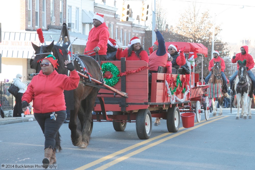 41st Annual Mayors Christmas Parade 2014 Division 1\nPhotography by: Buckleman Photography\nall images ©2014 Buckleman Photography\nThe images displayed here are of low resolution;\nReprints available, please contact us: \ngerard@bucklemanphotography.com\n410.608.7990\nbucklemanphotography.com\nFile number - 9977.jpg